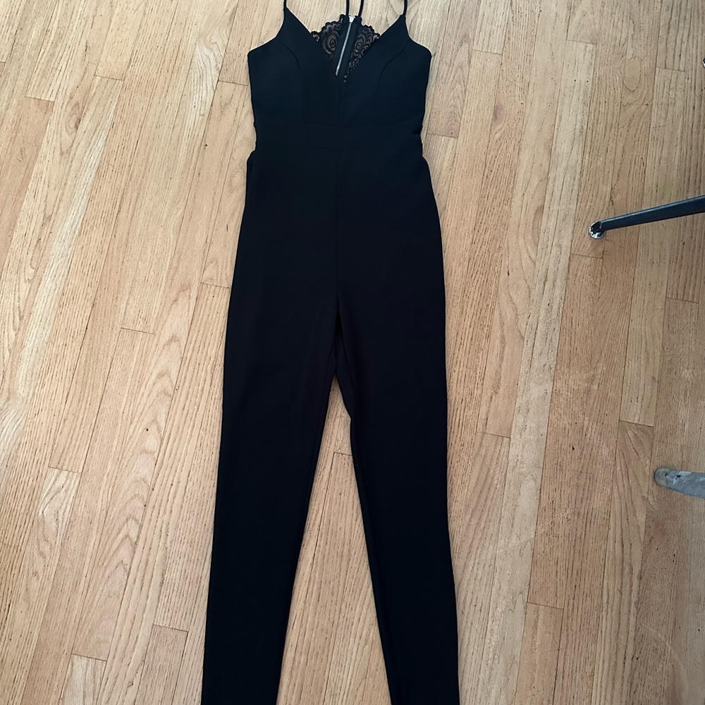 Sexy Black one-piece jumpsuit, new with tags